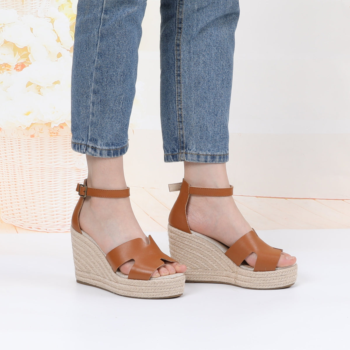 TONIVIS cognac leather platform wedge sandals on model