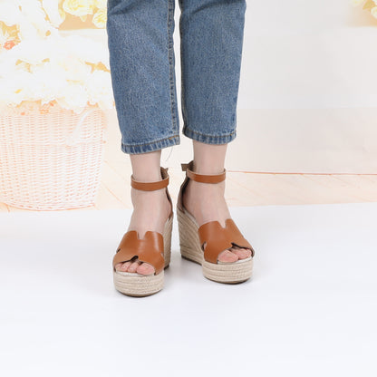 TONIVIS cognac leather platform wedge sandals on model front