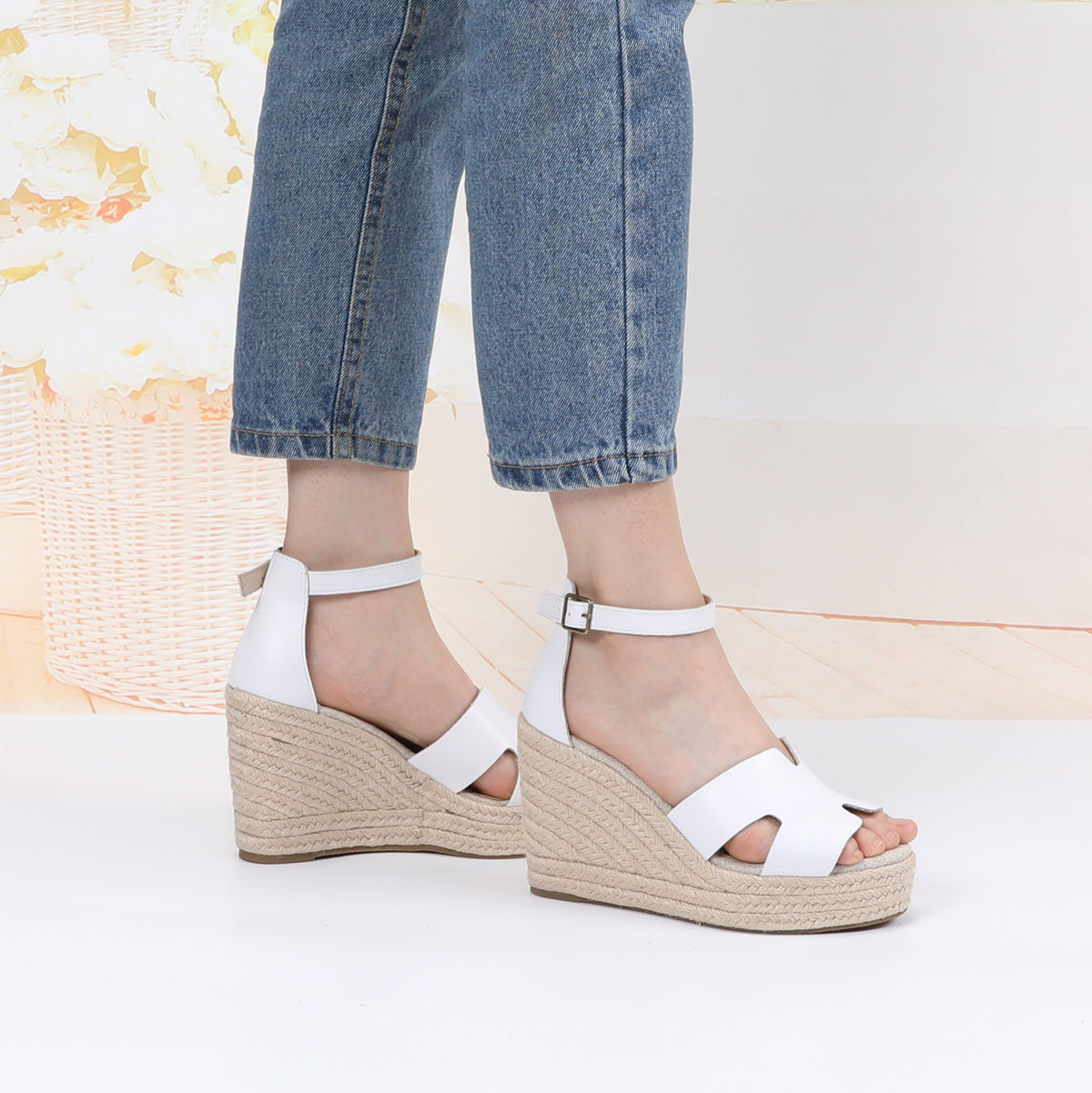 TONIVIS white leather platform wedge sandals on model side